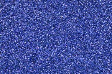 Mavi dekoratif payetler. Küçük öğelerden parlak bokeh ışıkları ile arka plan görüntüsü