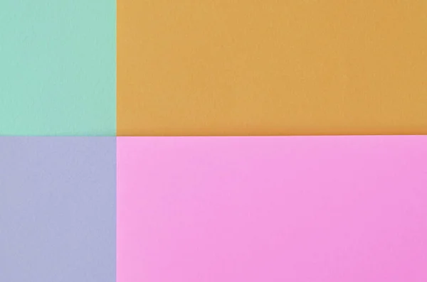 Tekstura tła mody pastelowych kolorach. Papier różowy, fioletowy, pomarańczowy i niebieski wzór geometryczny. — Zdjęcie stockowe