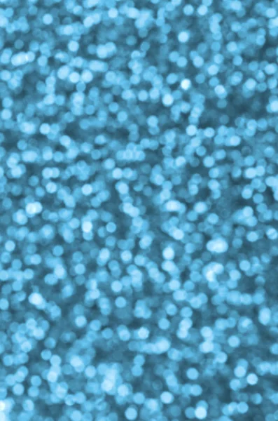 Sfocate paillettes decorative blu. Immagine di sfondo con luci bokeh lucide da piccoli elementi — Foto Stock