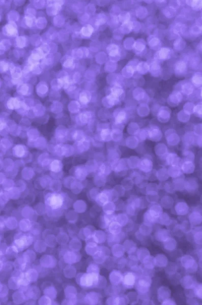 Sfocate paillettes decorative viola. Immagine di sfondo con luci bokeh lucide da piccoli elementi — Foto Stock