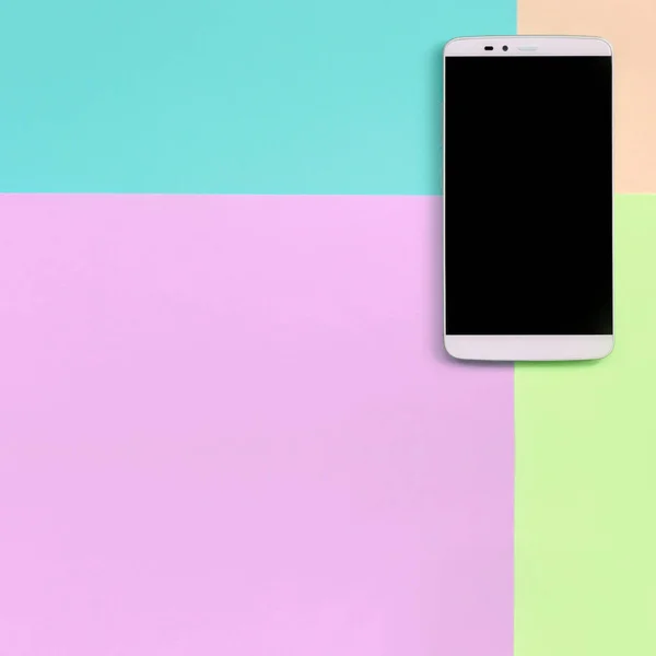 Modern smartphone with black screen on texture background of fashion pastel pink, blue, coral and lime colors