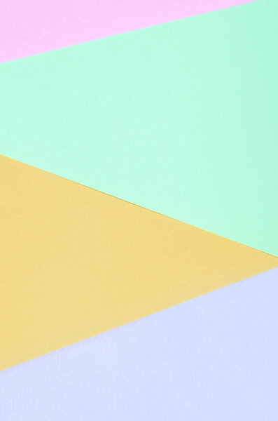 Текстура фона моды пастельные цвета. Бумаги розового, фиолетового, оранжевого и синего цветов
.