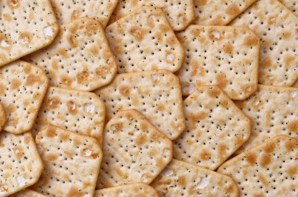 Tuc Original Snack Crackers lies on market table stacked in big pile — Stock Photo, Image