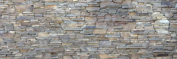 Modern pattern of flatten stone wall decorative surfaces in brow — Stock Photo, Image