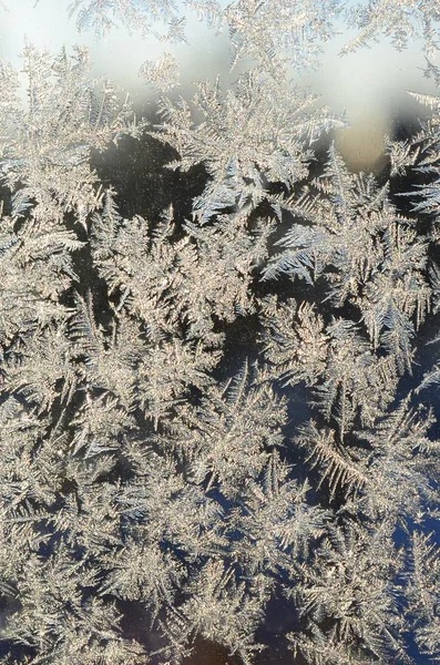 Snowflakes frost rime macro on window glass pane — Stock Photo, Image