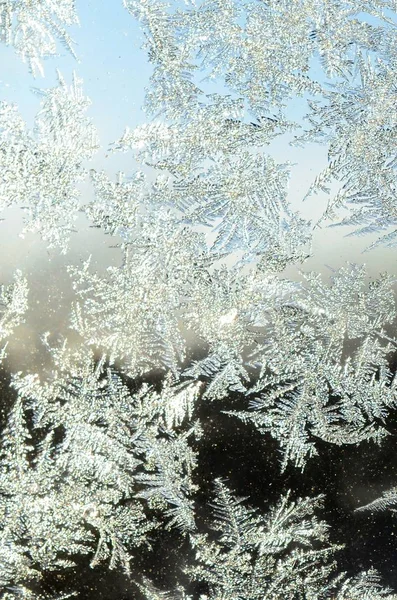 Snowflakes frost rime macro on window glass pane — Stock Photo, Image