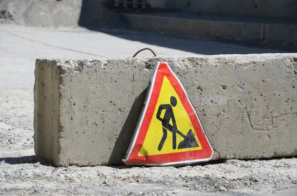 Road works sign for construction works in city street