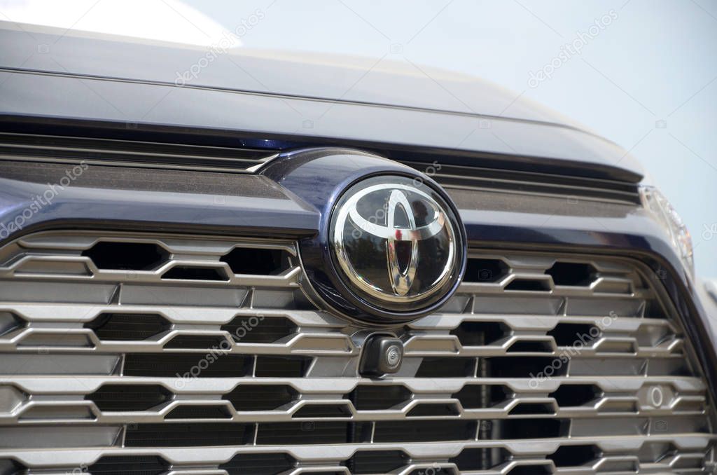 KHARKOV, UKRAINE - AUGUST 31, 2019: Toyota logo close up. Toyota Motor Corporation is Japanese multinational automotive manufacturer headquartered in Toyota, Aichi