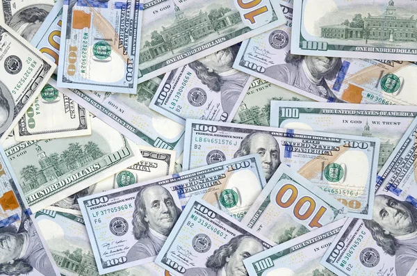 Vista superior de los billetes de cien dólares hechos de fondo. USD concepto de moneda y rica vida — Foto de Stock