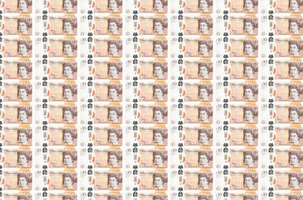 10英国ポンド紙幣生産コンベアに印刷されます 多くの請求書のコラージュ 通貨のインフレと切り下げの概念 — ストック写真