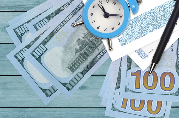 100 Dollars Bills Alarm Clock Pen Envelopes Tax Season Concept — Stock Photo, Image