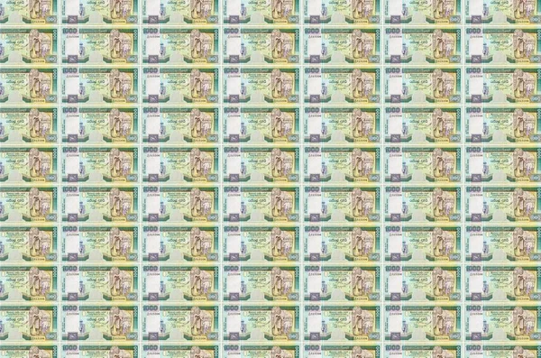 000 스리랑카 지폐는 컨베이어로 지폐들의 콜라주 팽창과 평가절하의 — 스톡 사진