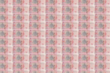 10 Ukrayna hrivniası banknotları para üretim taşıyıcısı olarak basıldı. Bir sürü banknotun kolajı. Para birimi enflasyonu ve devalüasyon kavramı