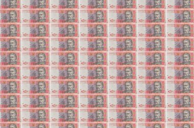 10 Ukrayna hrivniası banknotları para üretim taşıyıcısı olarak basıldı. Bir sürü banknotun kolajı. Para birimi enflasyonu ve devalüasyon kavramı