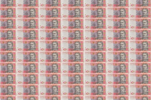 10份乌克兰格里夫尼亚钞票印在货币生产传送机上 许多帐单的拼凑 货币通货膨胀和货币贬值的概念 — 图库照片