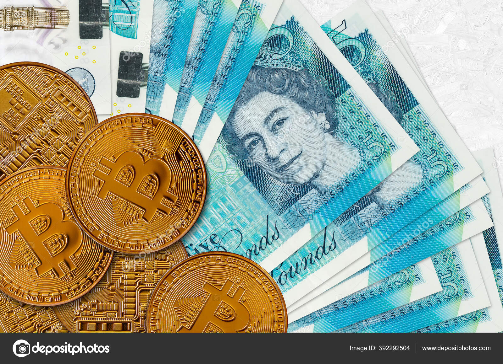 5英镑钞票和黄金比特币加密货币投资概念加密采矿或交易——图库图片© Mehaniq #392292504