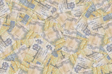 25 Mısır kuruşu banknotları büyük yığının içinde yatıyor. Zengin yaşam kavramsal geçmişi. Büyük miktarda para.