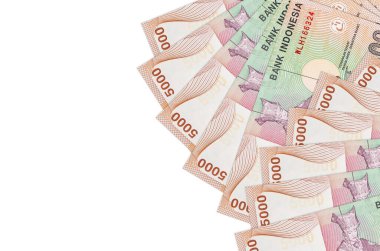 5000 Endonezya rupia banknotu beyaz arka planda, kopyalama alanı ile izole edilmiş. Zengin yaşam kavramsal geçmişi. Büyük miktarda ulusal para birimi zenginliği