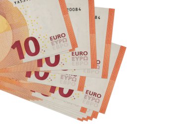 10 avroluk banknotlar küçük gruplar halinde ya da beyaz paketler halinde. Kopyalama alanı olan bir model. İş ve para değişimi kavramı