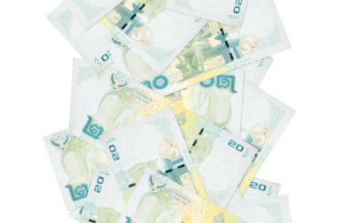 20 Tayland Baht senedi beyazlar üzerinde uçuyor. Birçok banknot sol ve sağ tarafta beyaz kopya alanı ile düşüyor