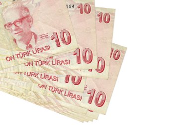 10 Türk lirası banknotlar küçük gruplar halinde ya da beyaz paketler halinde uzanıyor. Kopyalama alanı olan bir model. İş ve para değişimi kavramı