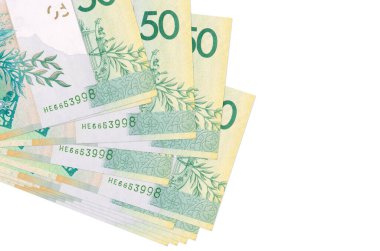 50 Belorus rublesi banknotları küçük gruplar halinde ya da beyaza izole edilmiş paketler halinde bulunur. Kopyalama alanı olan bir model. İş ve para değişimi kavramı