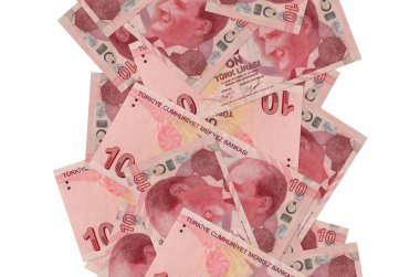 10 Türk lirası beyazın üzerinde izole bir şekilde uçuyor. Birçok banknot sol ve sağ tarafta beyaz kopya alanı ile düşüyor