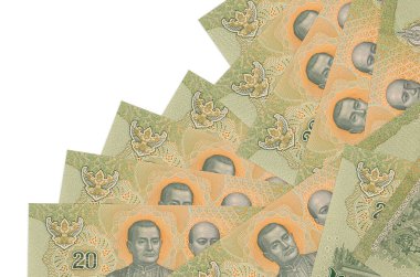 20 Tayland Baht banknotu beyaza izole edilmiş farklı bir sırayla yatar. Yerel bankacılık ya da para kazanma konsepti. İş arkaplanı afişi