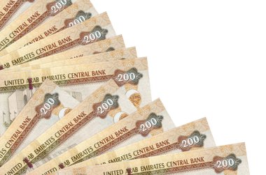 200 BAE dirhem banknotu beyaz arka planda izole bir şekilde duruyor. Fan kapağında da fotokopi alanı var. Maaş zamanı kavramı veya finansal işlemler