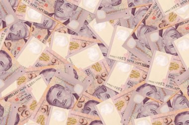 2 Singapur doları banknotlar büyük yığının içinde yatıyor. Zengin yaşam kavramsal geçmişi. Büyük miktarda para.