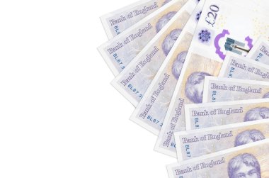 20 İngiliz sterlinli banknotlar beyaz arka planda, fotokopi alanı ile izole edilmiş. Zengin yaşam kavramsal geçmişi. Büyük miktarda ulusal para birimi zenginliği