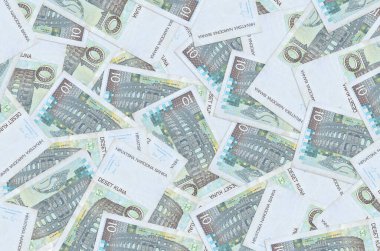 10 Hırvat kuna faturası büyük bir yığın halinde duruyor. Zengin yaşam kavramsal geçmişi. Büyük miktarda para.