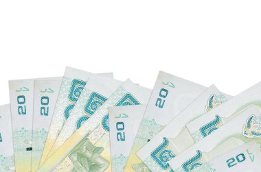 Ekranın alt tarafında 20 Tayland Baht banknotu var. Beyaz arka planda izole edilmiş ve fotokopi alanı var. Paralı iş kavramları için arkaplan afişi şablonu
