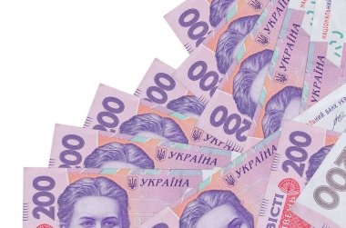 200 Ukrayna hrivniası banknotu beyazın üzerinde ayrı bir sırayla yatıyor. Yerel bankacılık ya da para kazanma konsepti. İş arkaplanı afişi
