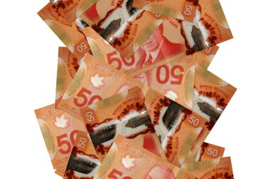 50 Kanada doları beyazın üzerinde izole bir şekilde uçuyor. Birçok banknot sol ve sağ tarafta beyaz kopya alanı ile düşüyor