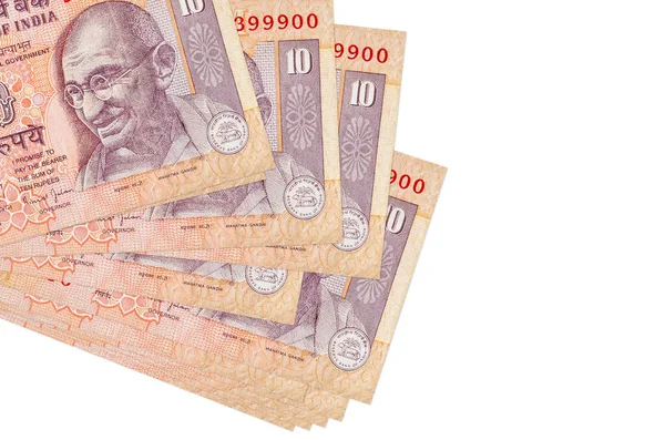 10 Hint rupisi küçük gruplar halinde ya da beyaz paketler halinde yatar. Kopyalama alanı olan bir model. İş ve para değişimi kavramı