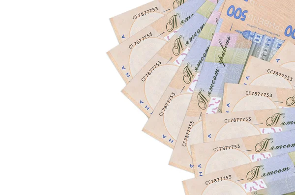 500 Ukrayna hrivniası banknotları beyaz arka planda fotokopi uzayı ile izole edilmiş yatar. Zengin yaşam kavramsal geçmişi. Büyük miktarda ulusal para birimi zenginliği