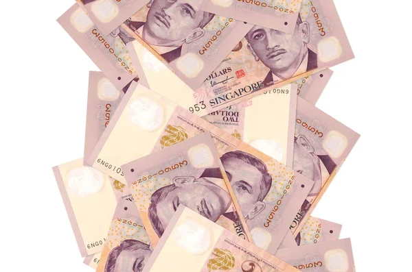 2 Singapur doları beyazın üzerinde izole bir şekilde uçuyor. Birçok banknot sol ve sağ tarafta beyaz kopya alanı ile düşüyor