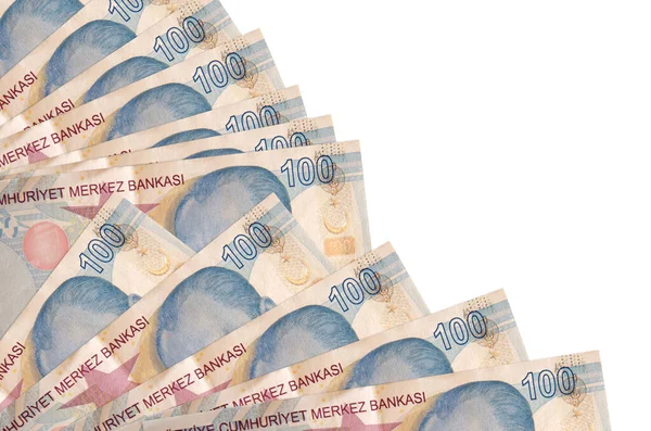 100 Türk lirası beyaz zemin üzerinde izole edilmiş, fotokopi alanı da pervaneye yakın duruyor. Maaş zamanı kavramı veya finansal işlemler
