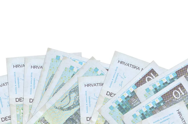 Ekranın alt tarafında bulunan 10 Hırvat kuna banknotu, beyaz zemin üzerinde fotokopi alanı ile izole bir şekilde duruyor. Paralı iş kavramları için arkaplan afişi şablonu
