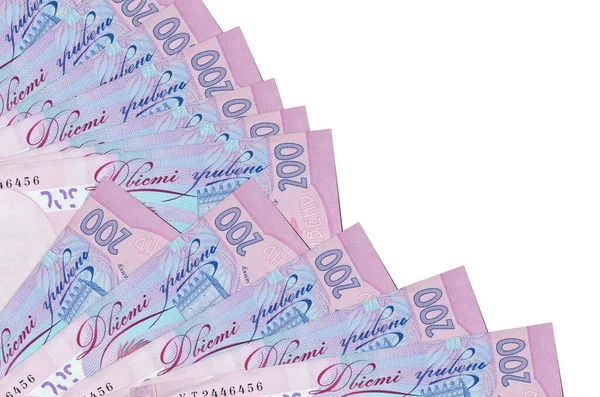 200 Ukrayna hrivniası banknotları beyaz arka planda izole edilmiş, fotokopi alanı da pervaneye yakın duruyor. Maaş zamanı kavramı veya finansal işlemler