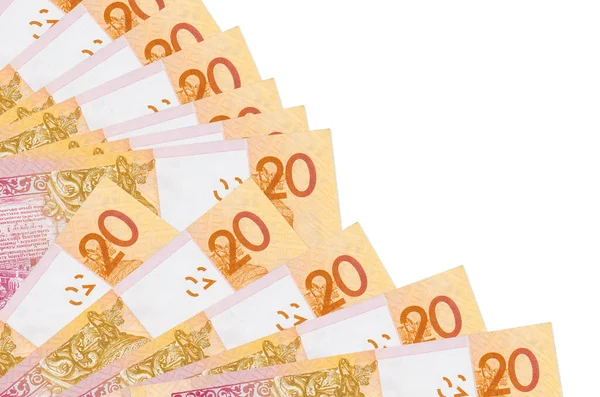 Beyaz zemin üzerinde izole edilmiş 20 Belorus rublesi banknotu var. Fan kaplamasında da fotokopi alanı var. Maaş zamanı kavramı veya finansal işlemler