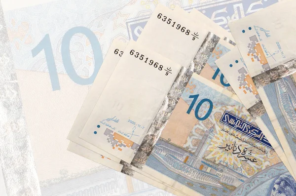 Тунисских Динаров Лежат Стопке Фоне Большой Полупрозрачной Банкноты Абстрактное Представление — стоковое фото