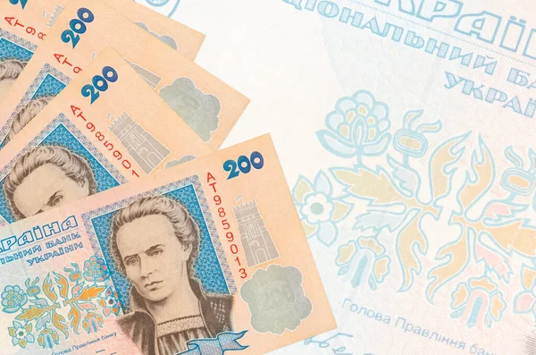 200 Ukraińskich Banknotów Hrywien Leży Stosach Tle Dużego Półprzezroczystego Banknotu — Zdjęcie stockowe