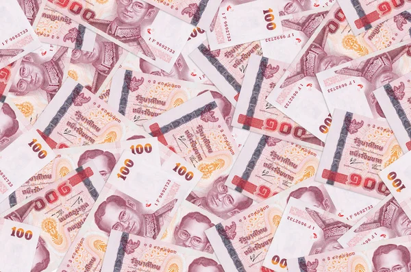 100 Tayland Baht faturası büyük bir yığın halinde duruyor. Zengin yaşam kavramsal geçmişi. Büyük miktarda para.