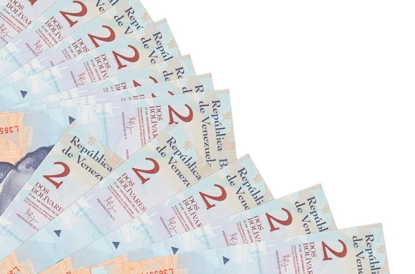 2 Venezuelalı Bolivar banknotu beyaz arka planda izole bir şekilde duruyor. Fan kaplamasında da kopya alanı var. Maaş zamanı kavramı veya finansal işlemler