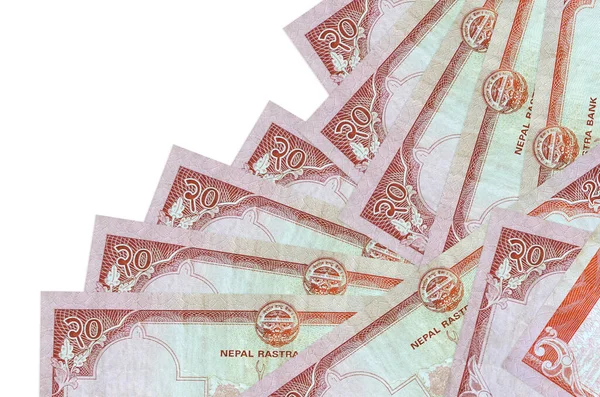 20 Nepal Rupisi banknotları beyaza izole edilmiş farklı bir sırayla yatar. Yerel bankacılık ya da para kazanma konsepti. İş arkaplanı afişi