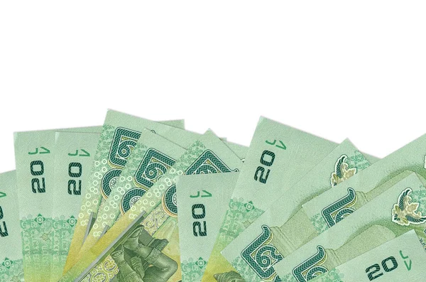 Ekranın alt tarafında 20 Tayland Baht banknotu var. Beyaz arka planda izole edilmiş ve fotokopi alanı var. Paralı iş kavramları için arkaplan afişi şablonu
