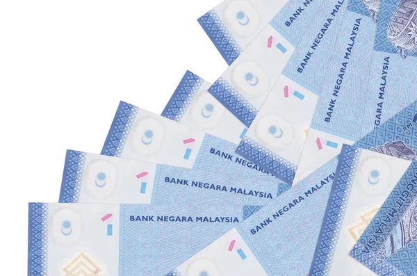 1 Malezya ringgit gagası beyaz üzerine izole edilmiş farklı bir sırayla yatar. Yerel bankacılık ya da para kazanma konsepti. İş arkaplanı afişi