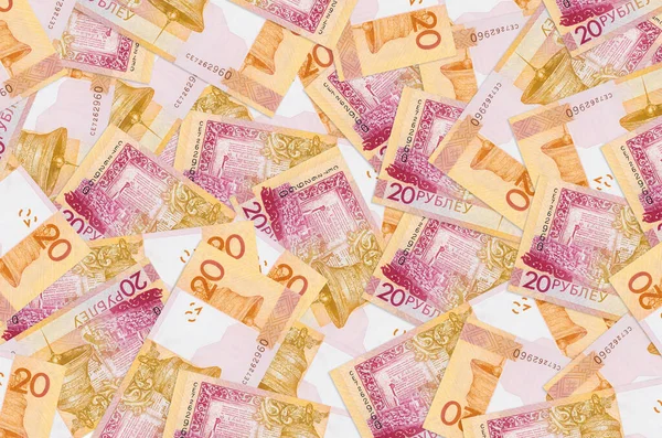20 Belorus rublesi banknotları büyük bir yığın halinde duruyor. Zengin yaşam kavramsal geçmişi. Büyük miktarda para.